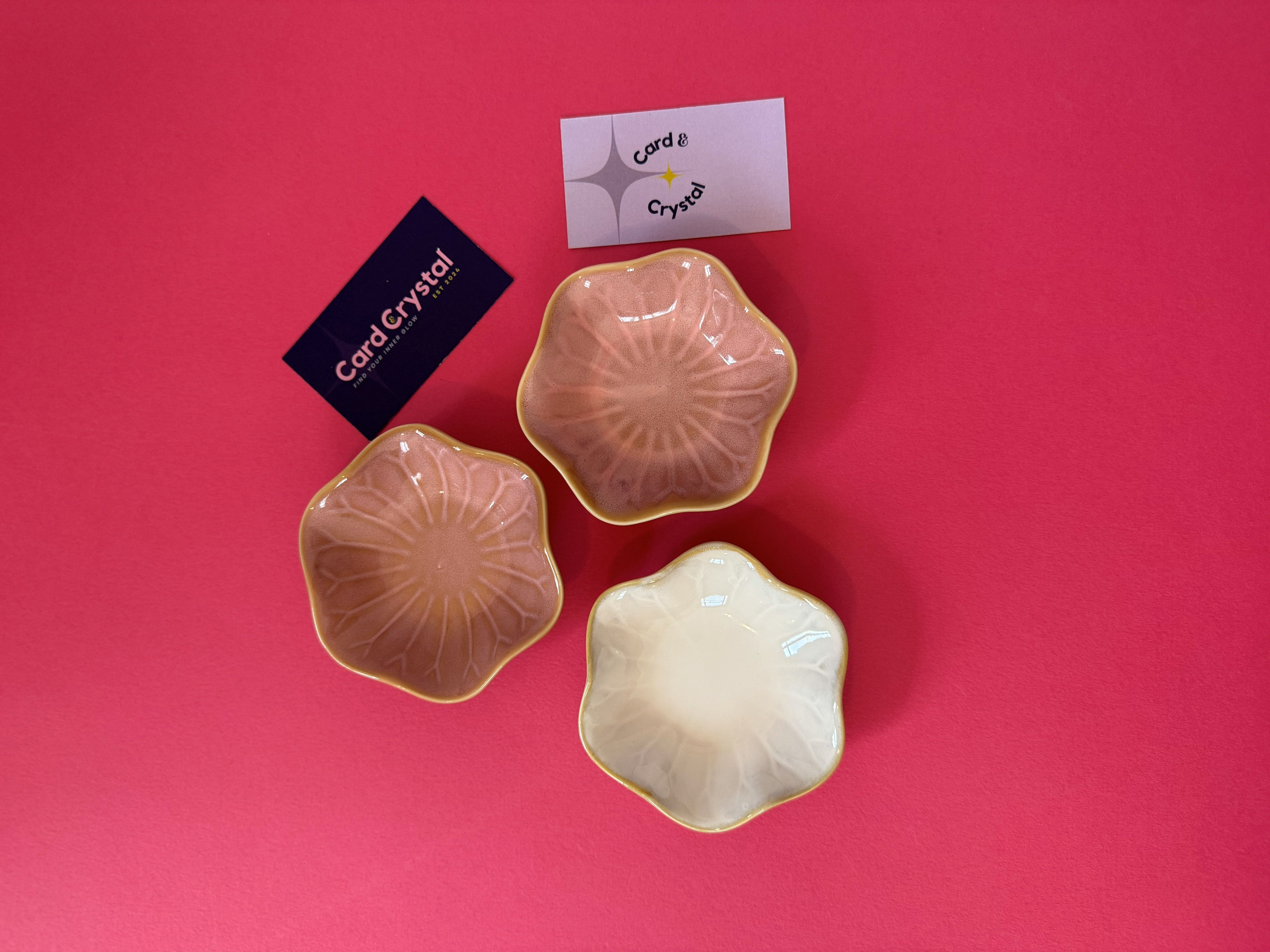 Three decorative bowls on a pink background with 'Card Crystal' branding.